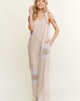 Mineral Washed Flower patched Bow spring jumpsuits - Next Generation Boutique