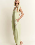 Mineral Washed Flower patched Bow spring jumpsuits - Next Generation Boutique