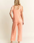 Mineral Washed Flower patched Bow spring jumpsuits - Next Generation Boutique